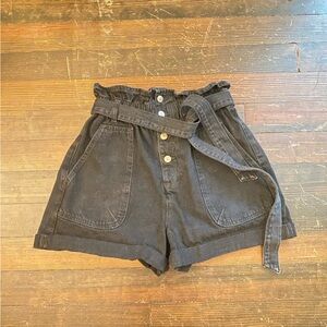 Black denim shorts with belt